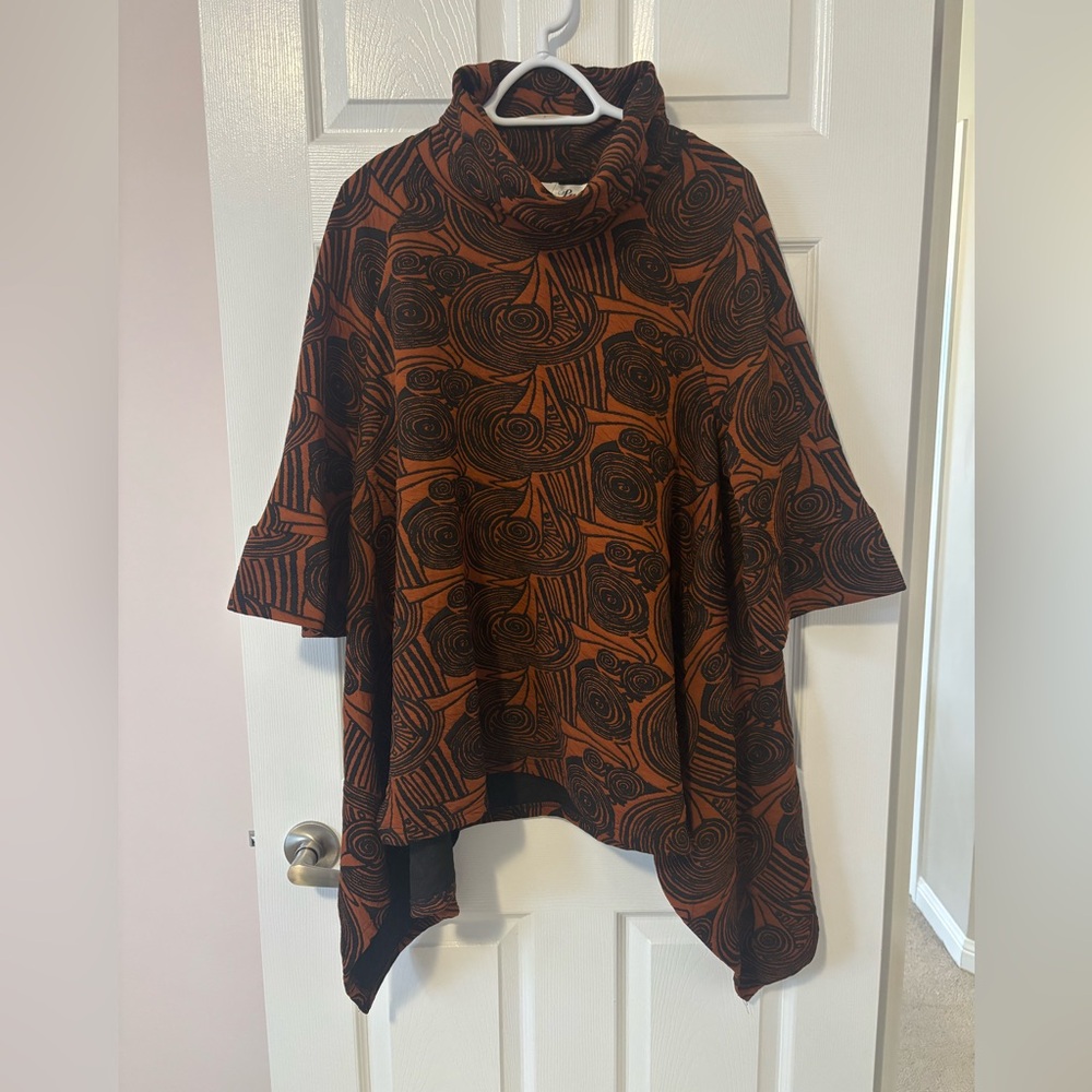 NWT rust color over cape.
